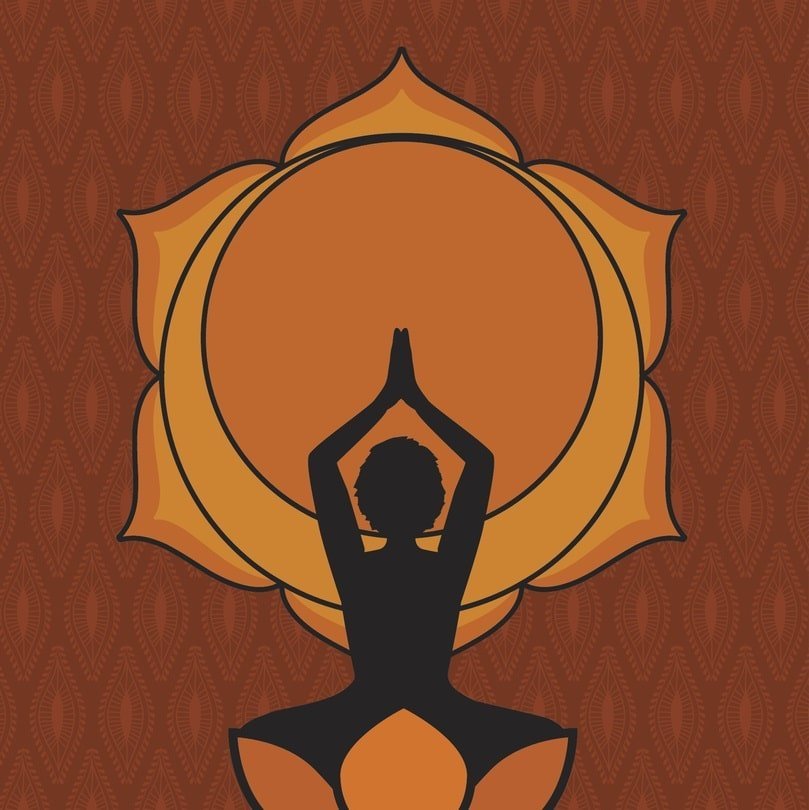 woman practicing yoga in front of sacral chakra symbol