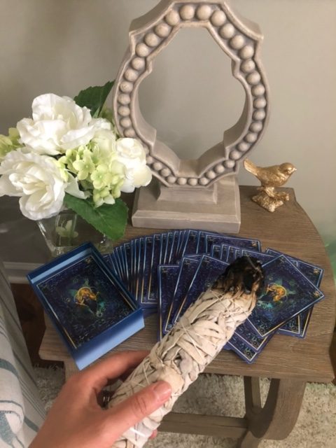 cleansing tarot cards with sage