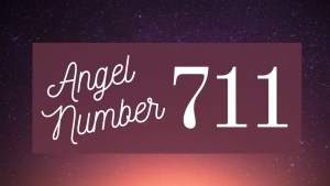 angel number 711 on purple background