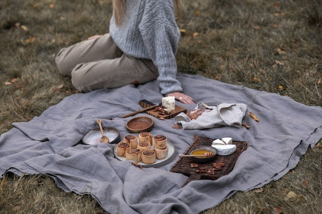 woman having picnic on fall day