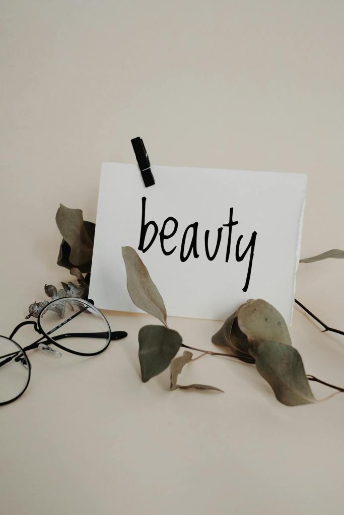 word beauty on white paper