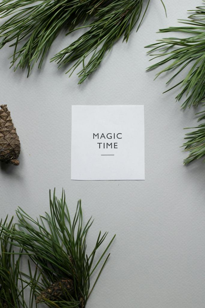 words 'magic time' on white paper
