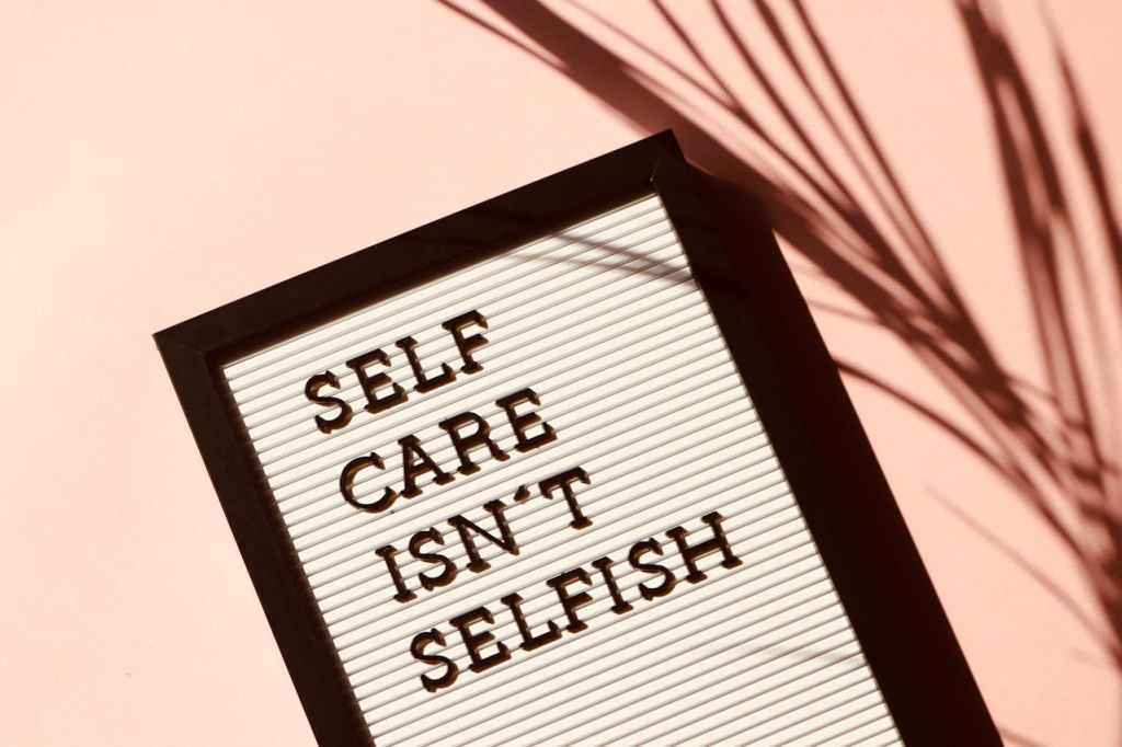 'self-care isn't selfish' sign